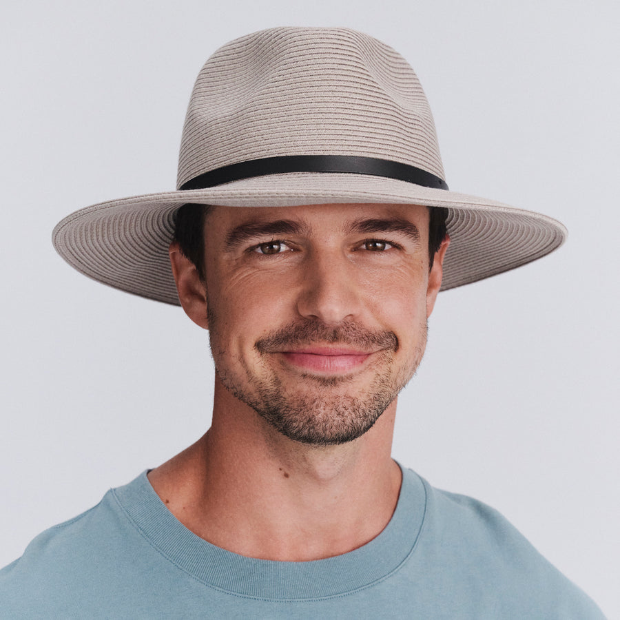 Model wearing Darby fedora hat in Stone, facing the front