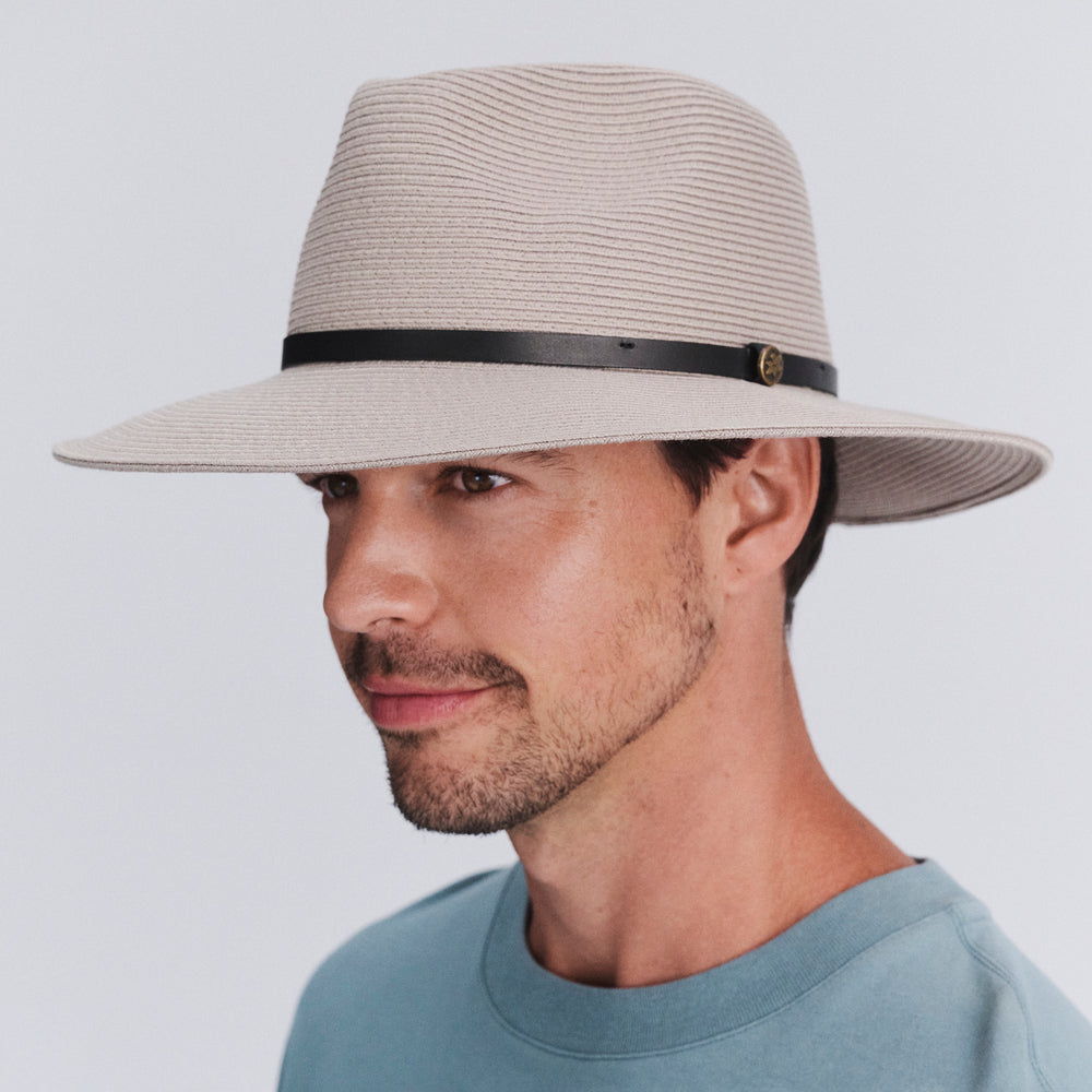 Model wearing Darby fedora hat in Stone, three‑quarter angle
