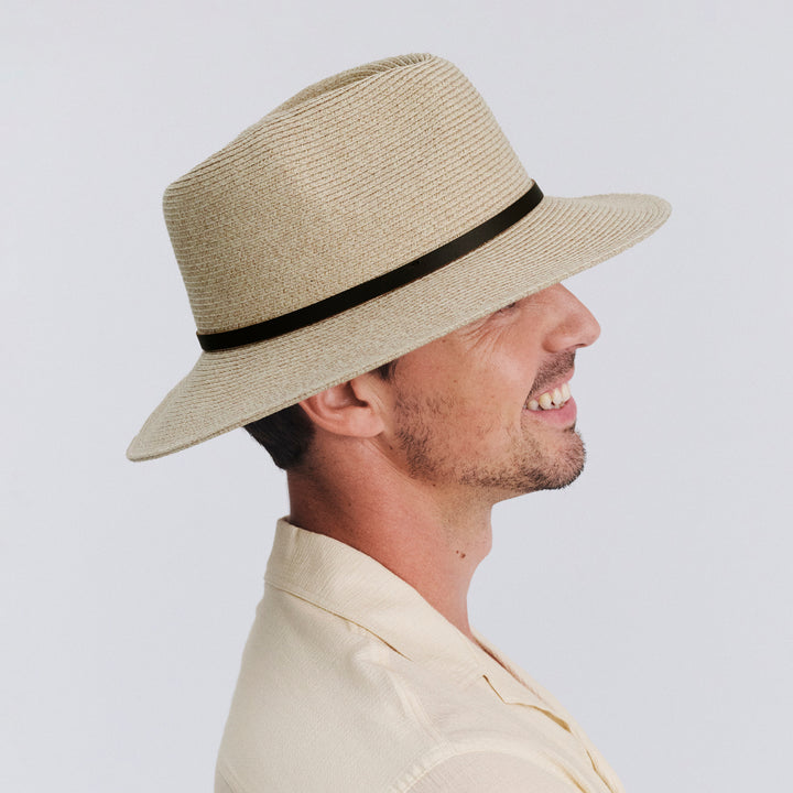 Male model wearing Darby fedora hat in Wheat, side view