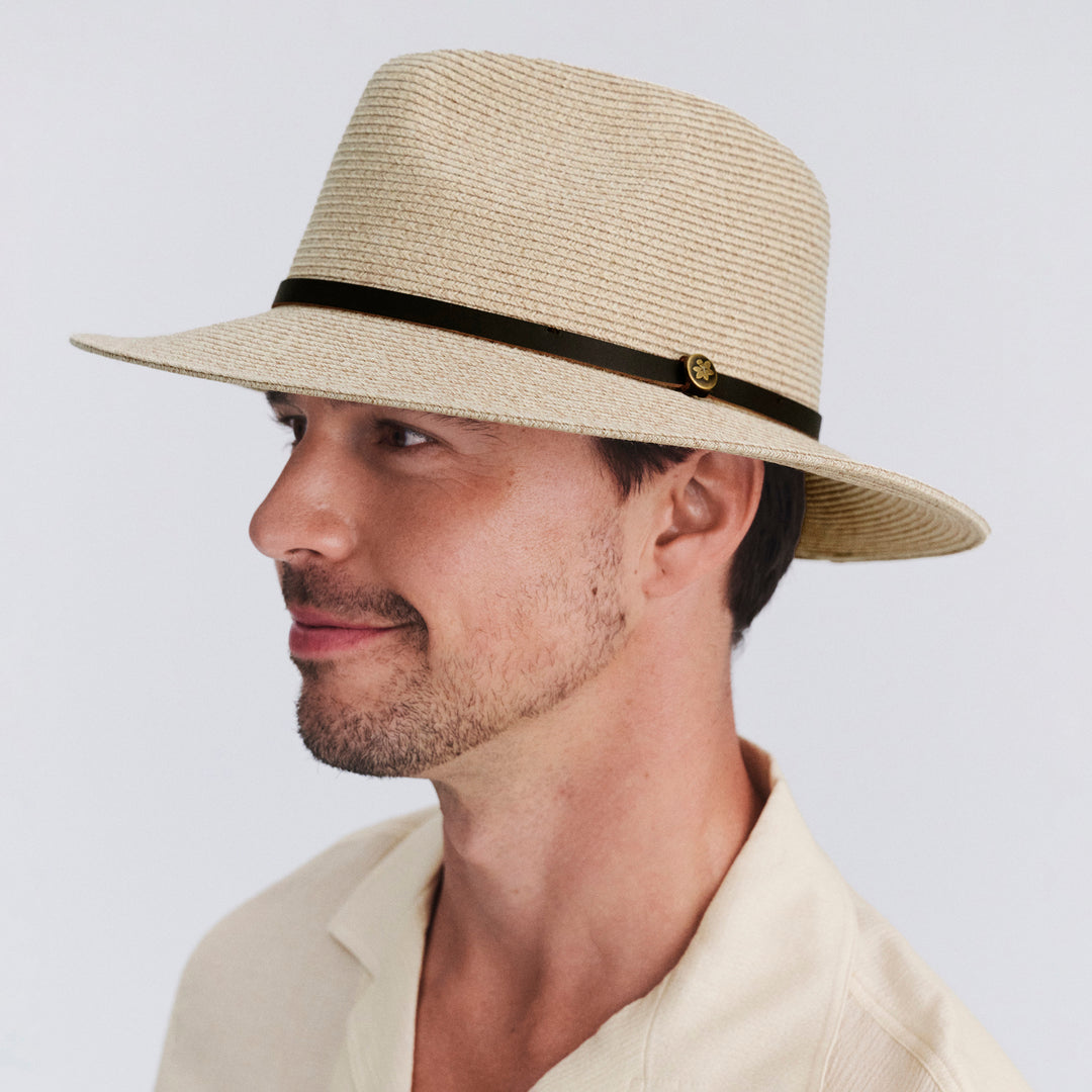 Male model wearing Darby fedora hat in Wheat, three‑quarter angle