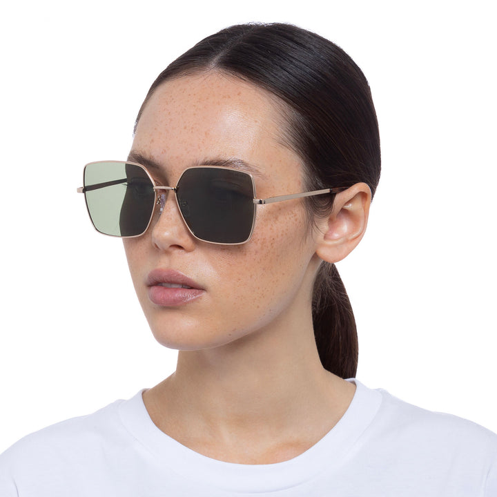 Cancer Council | Kirribilli Sunglasses - Female Model Angle | Gold | UPF50+ Protection