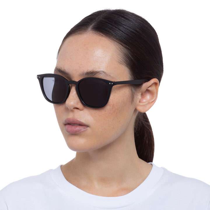 Cancer Council | Cadens Sunglasses - Female Model Angle | Matte Black | UPF50+ Protection