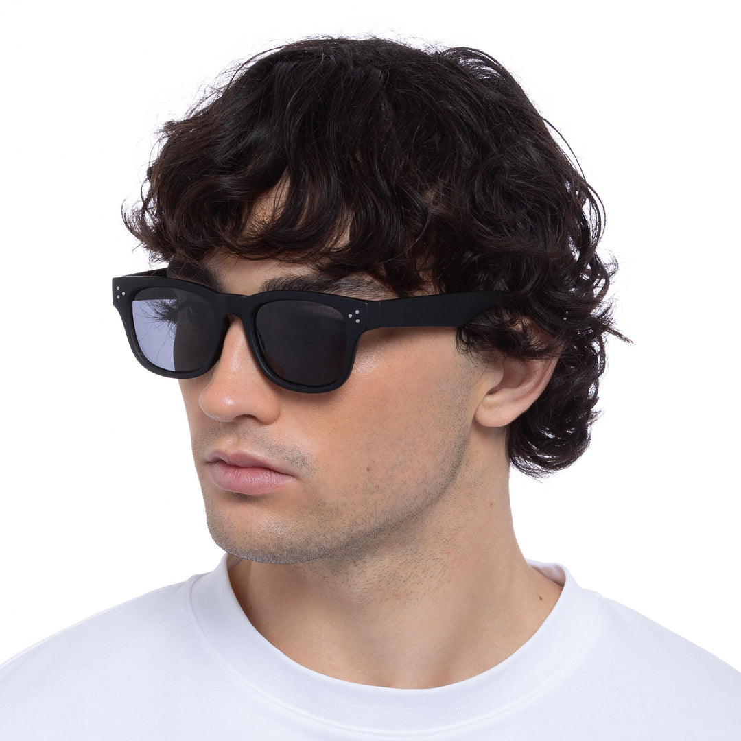 Cancer Council | Noddy Youth Sunglasses - Male Model Angle | Matte Black | UPF50+ Protection