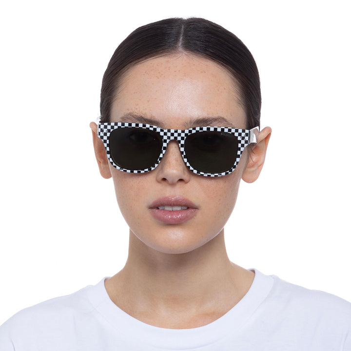 Cancer Council | Noddy Youth Sunglasses - Female Model Front | Black White Check | UPF50+ Protection