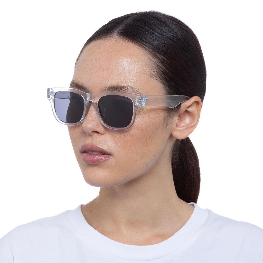 Cancer Council | Noddy Youth Sunglasses - Female Model Angle | Clear | UPF50+ Protection