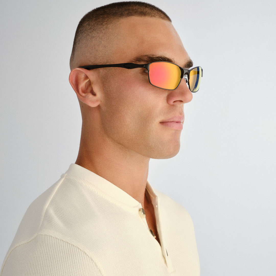 Male model wearing Leederville sunglasses in Black, three‑quarter angle