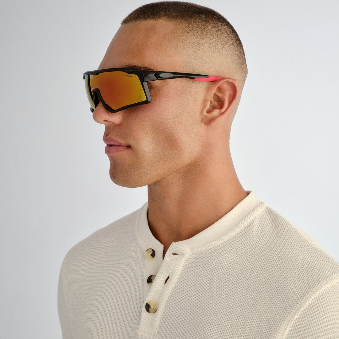 Male model wearing Nedlands sunglasses in Black, three‑quarter angle