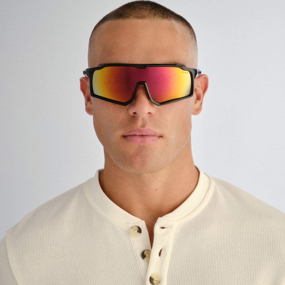 Front profile of male model wearing Nedlands sunglasses in Black