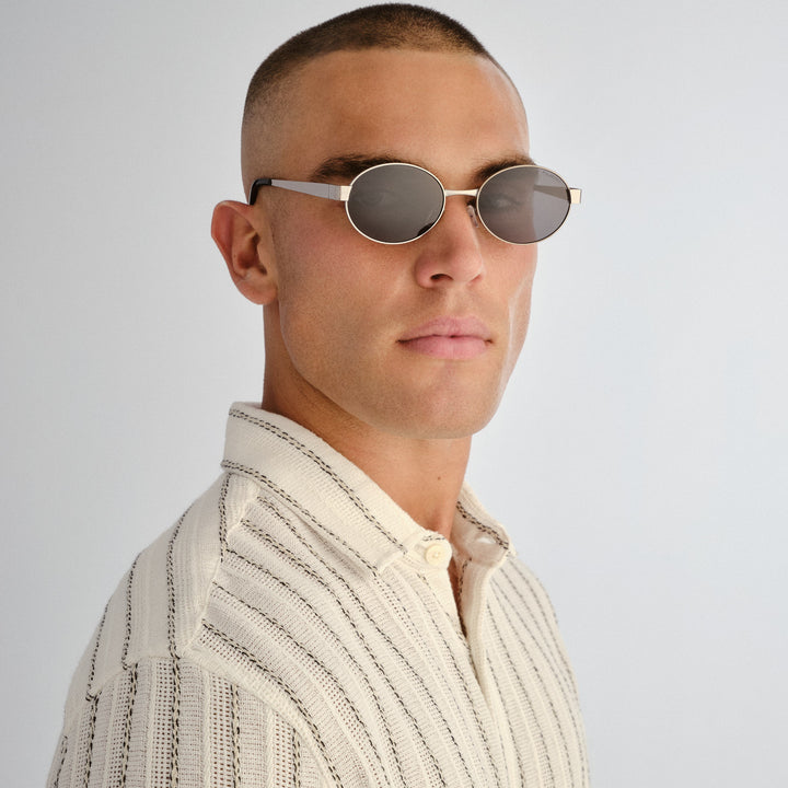Front profile of male model wearing Norwood sunglasses in Gunmetal