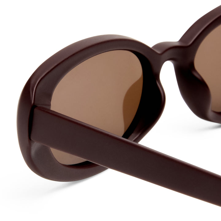 Northbridge sunglasses temple detail showing Matte Mulberry acetate texture