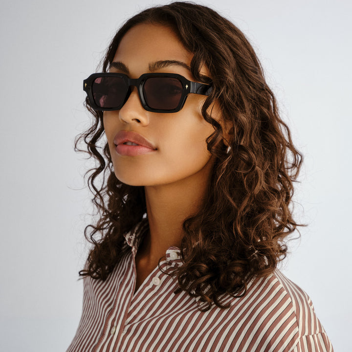 Side profile of female model wearing Mount Lawley sunglasses in Black