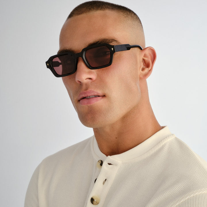 Side profile of male model wearing Mount Lawley sunglasses in Black