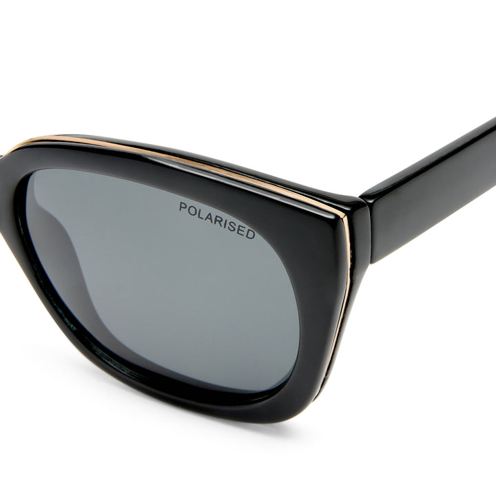 Teneriffe sunglasses in black, close-up detail of frame and gold temple details, showing material and finish