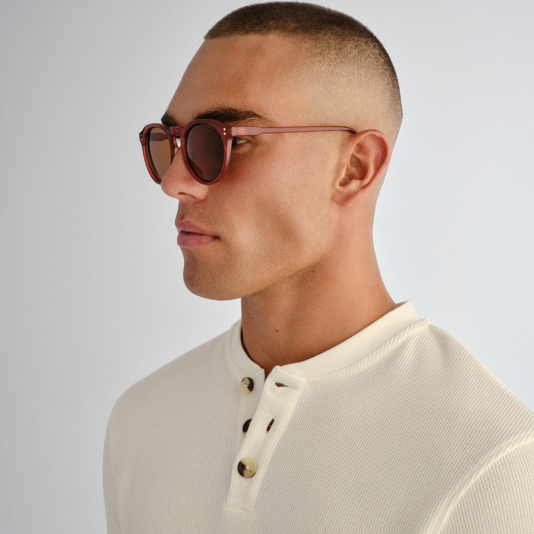 Side profile of male model wearing Bright sunglasses in Merlot