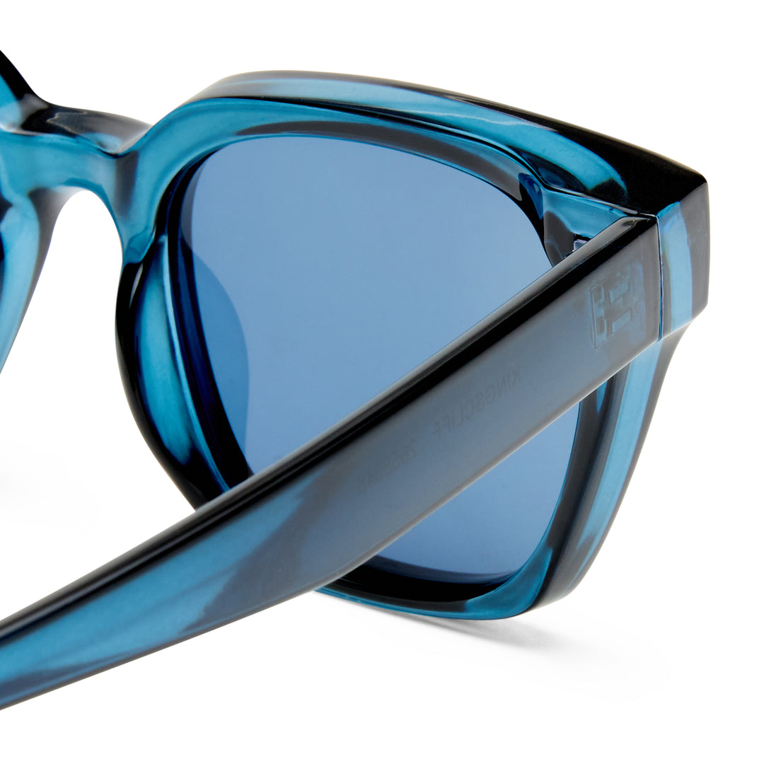 Blue sunglasses zoomed on frames on a white background