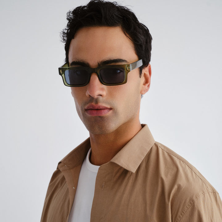 Male model wearing Austinmer Sunglasses in Khaki, front facing 