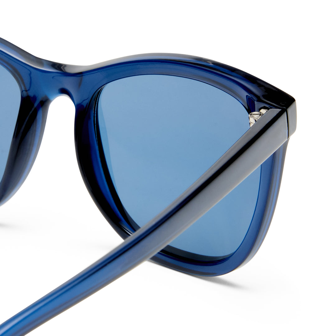 Blue sunglasses with a clear background
