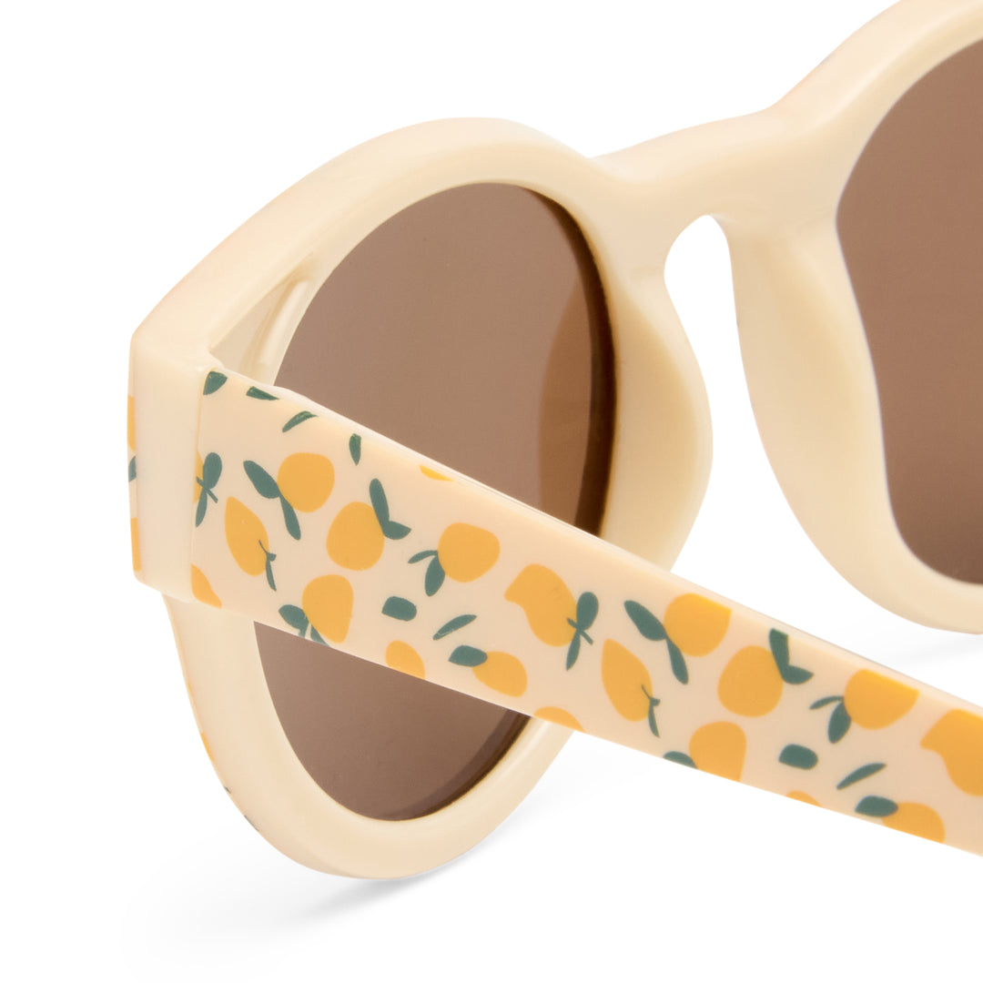 Magpie kids sunglasses temple detail showing Lemon Print pattern on arms