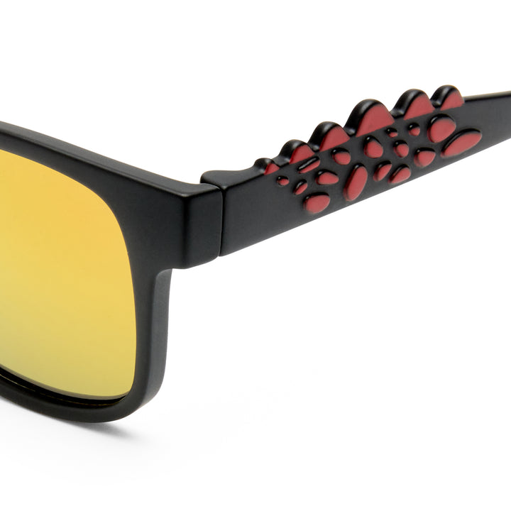 T‑Rex kids sunglasses temple detail showing red dinosaur graphic on Matte Black arm