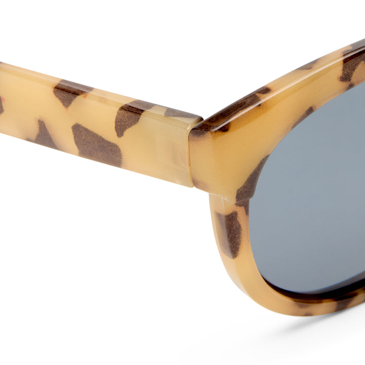 Kitty kids sunglasses temple detail showing Cookie Tort acetate pattern