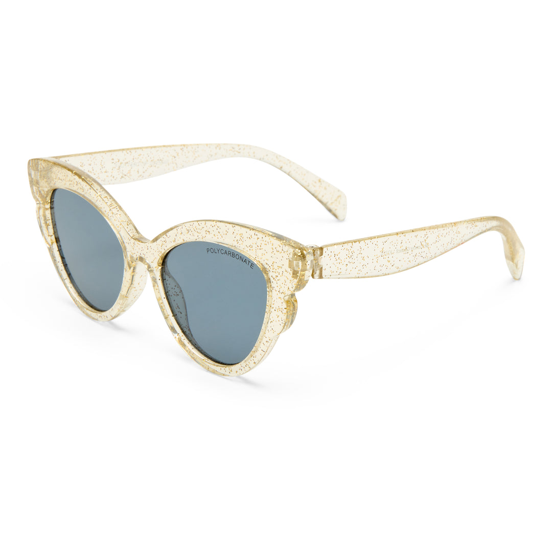Cat-eye sunglasses with a textured, glittery champagne gold frame and dark gray lenses, shown on a clean white background.
