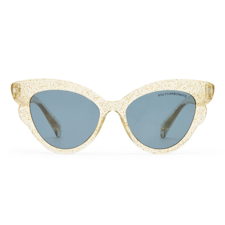 Cat-eye sunglasses with a textured, glittery champagne gold acetate frame and muted blue-gray lenses, shown against a plain white background.